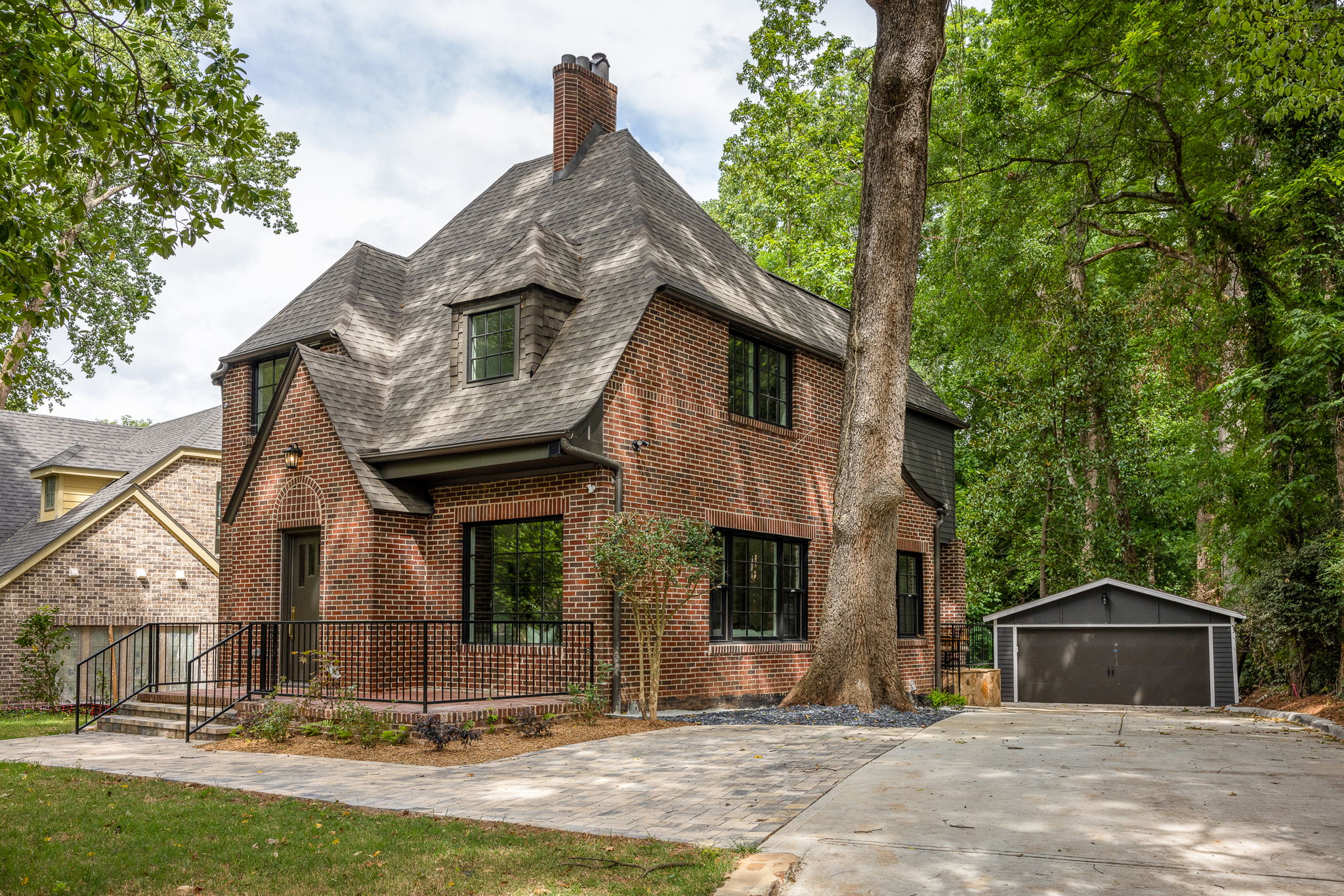 Brick House with Curved Roof